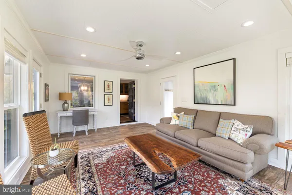 a living room with furniture and a couch