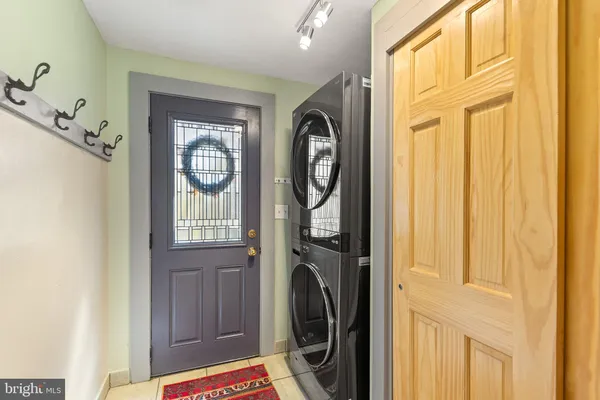 a front view of a house with washer and dryer
