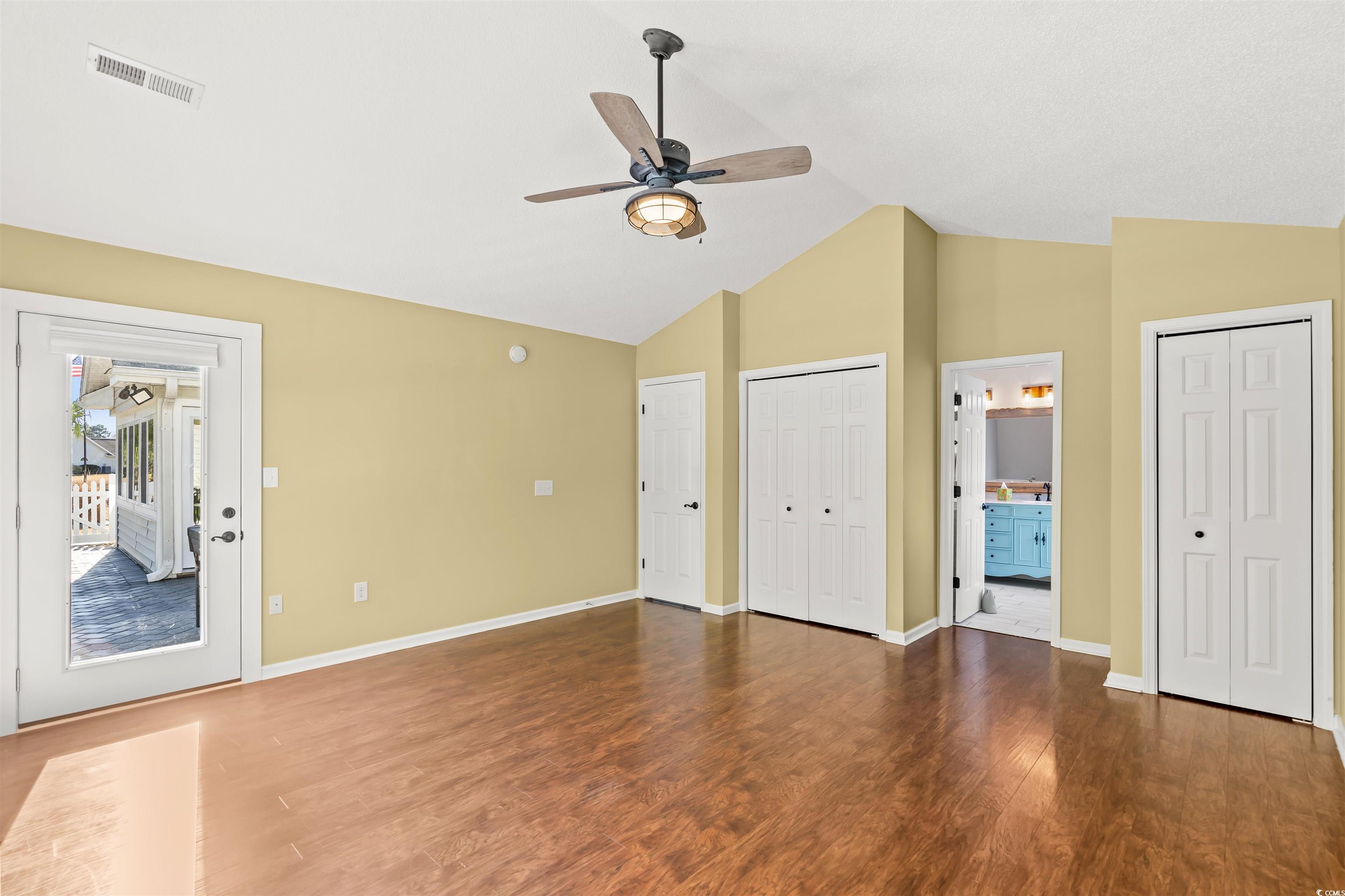 712 Potters Alley Murrells Inlet, SC 29576 - Photo 13 of 32 Master bedroom featuring lofted ceiling, ensuite b