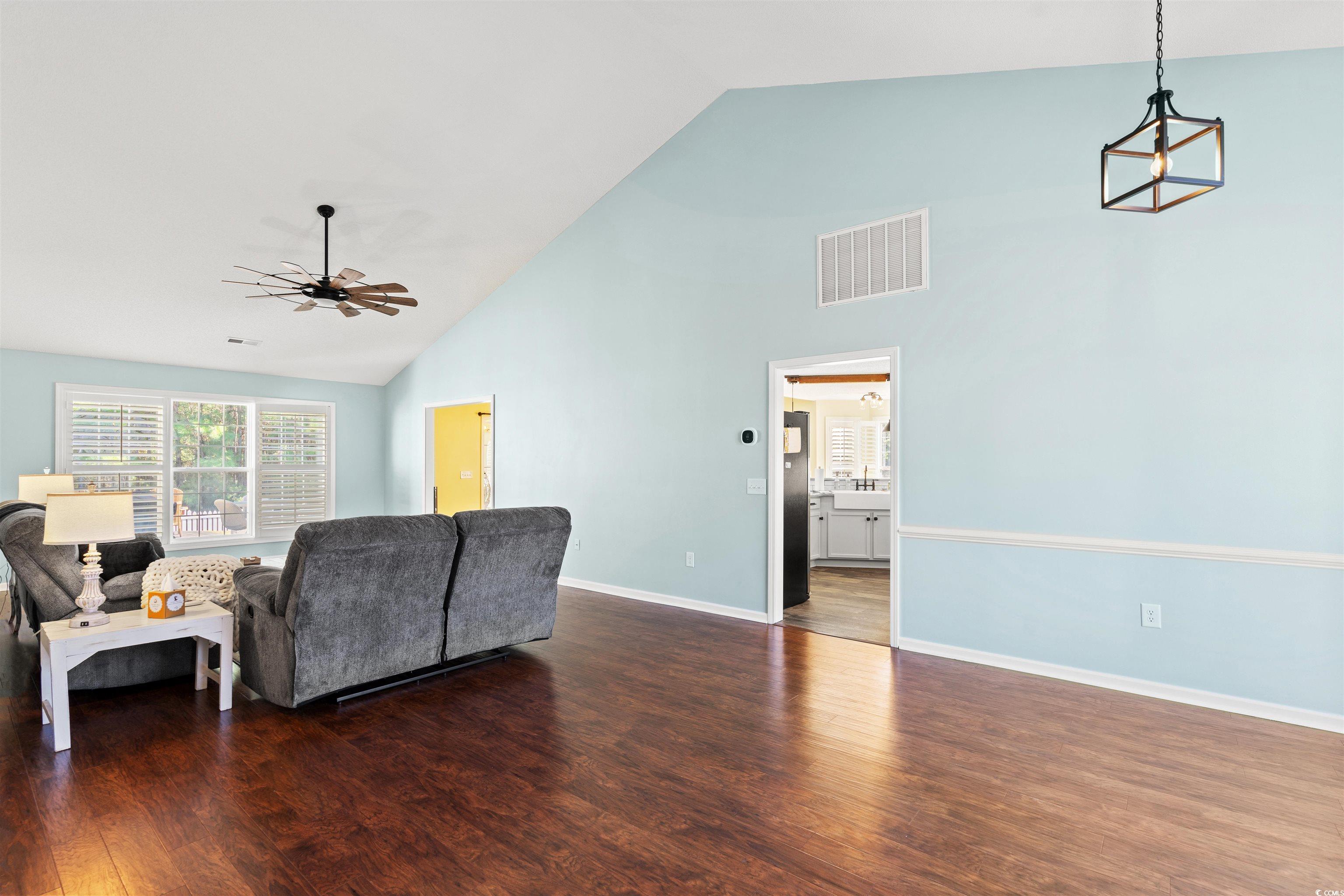 712 Potters Alley Murrells Inlet, SC 29576 - Photo 3 of 32 Living room with ceiling fan, dark hardwood / wood