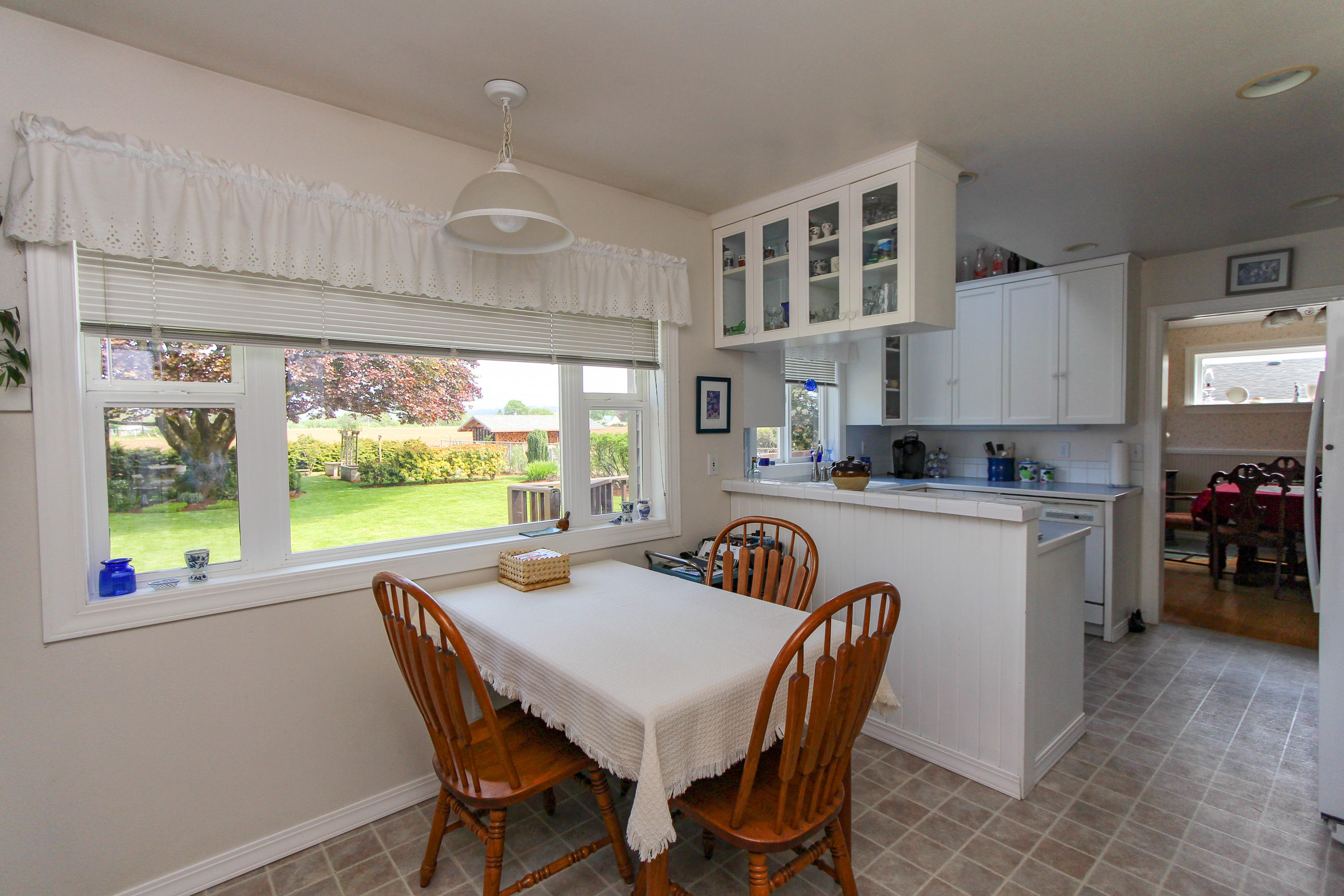 3225 Fitzpatrick Road Tillamook, OR 97141 - Photo 15 of 50 a dining room with furniture and a floor to ceiling window