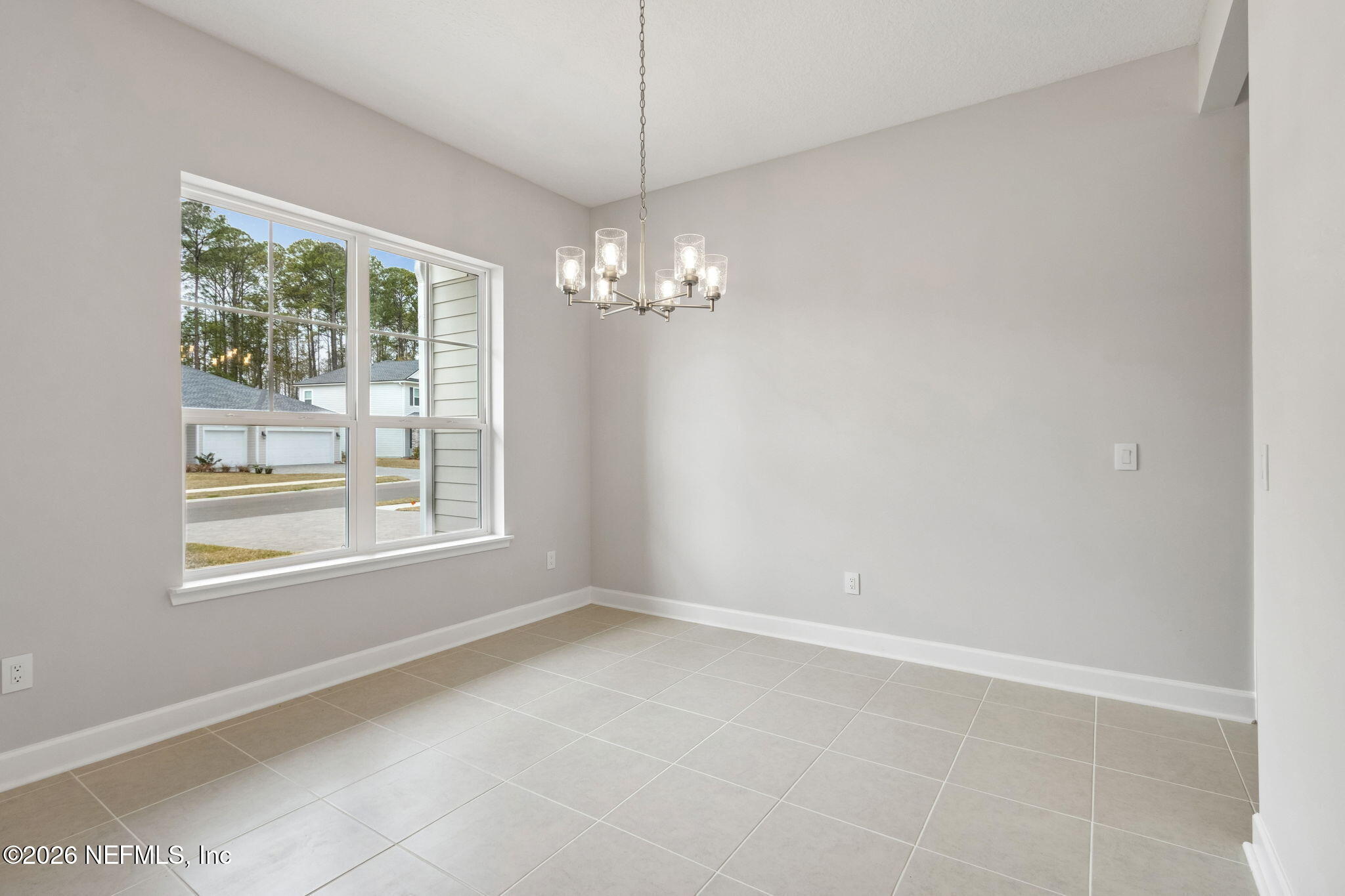 85321 Sandy Rdg Loop Yulee, FL 32097 - Photo 11 of 49 a view of a chandelier in big room and chandelier fan