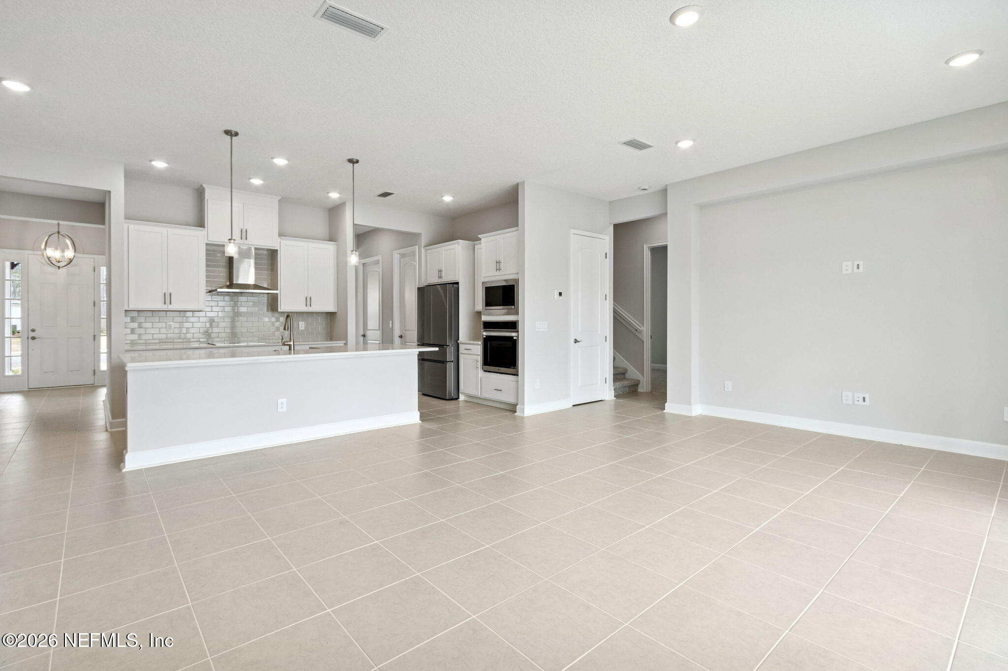 85321 Sandy Rdg Loop Yulee, FL 32097 - Photo 49 of 49 a view of kitchen with kitchen island a refrigerator and a sink