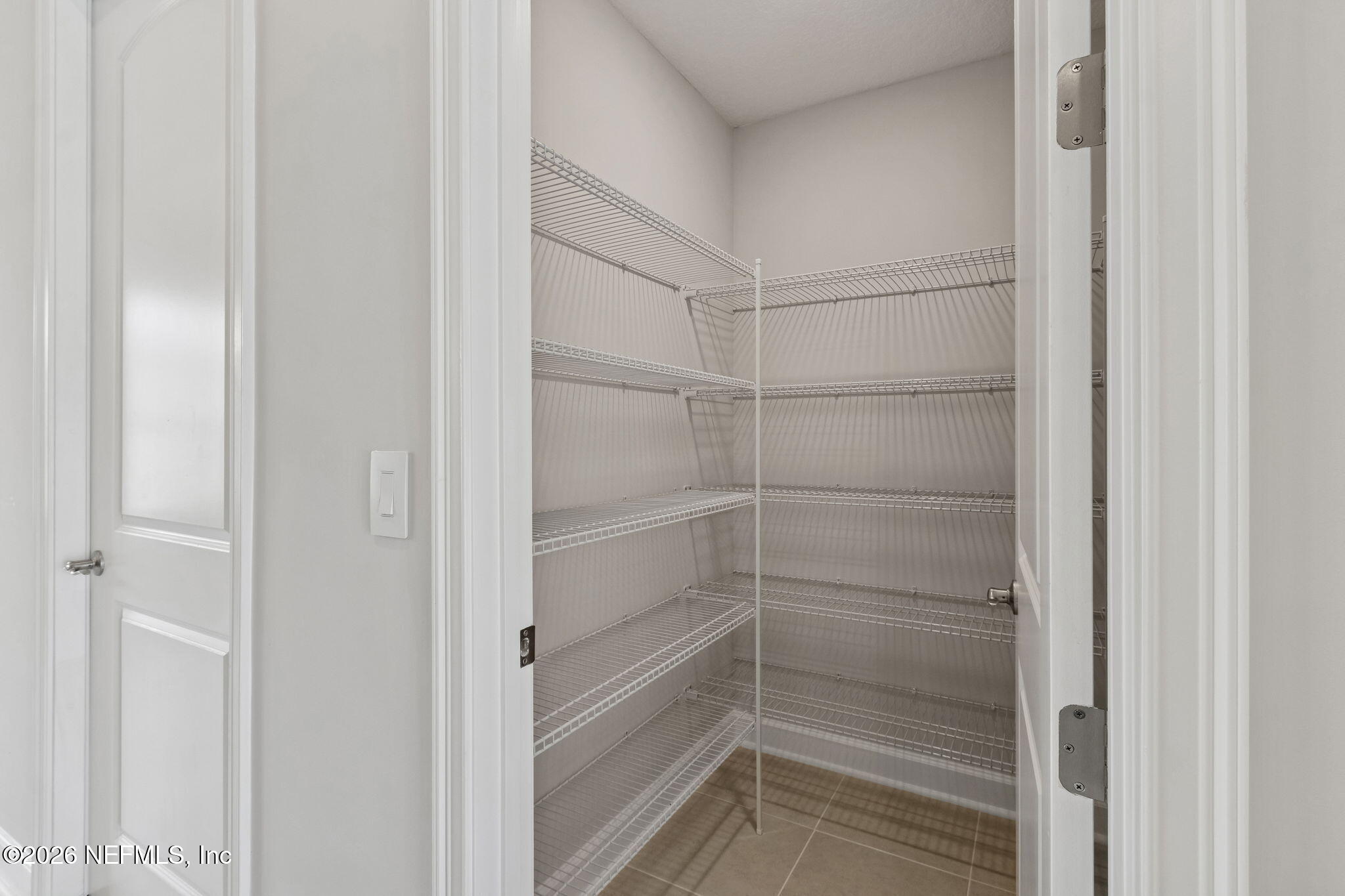 85321 Sandy Rdg Loop Yulee, FL 32097 - Photo 22 of 49 a view of a walk in closet