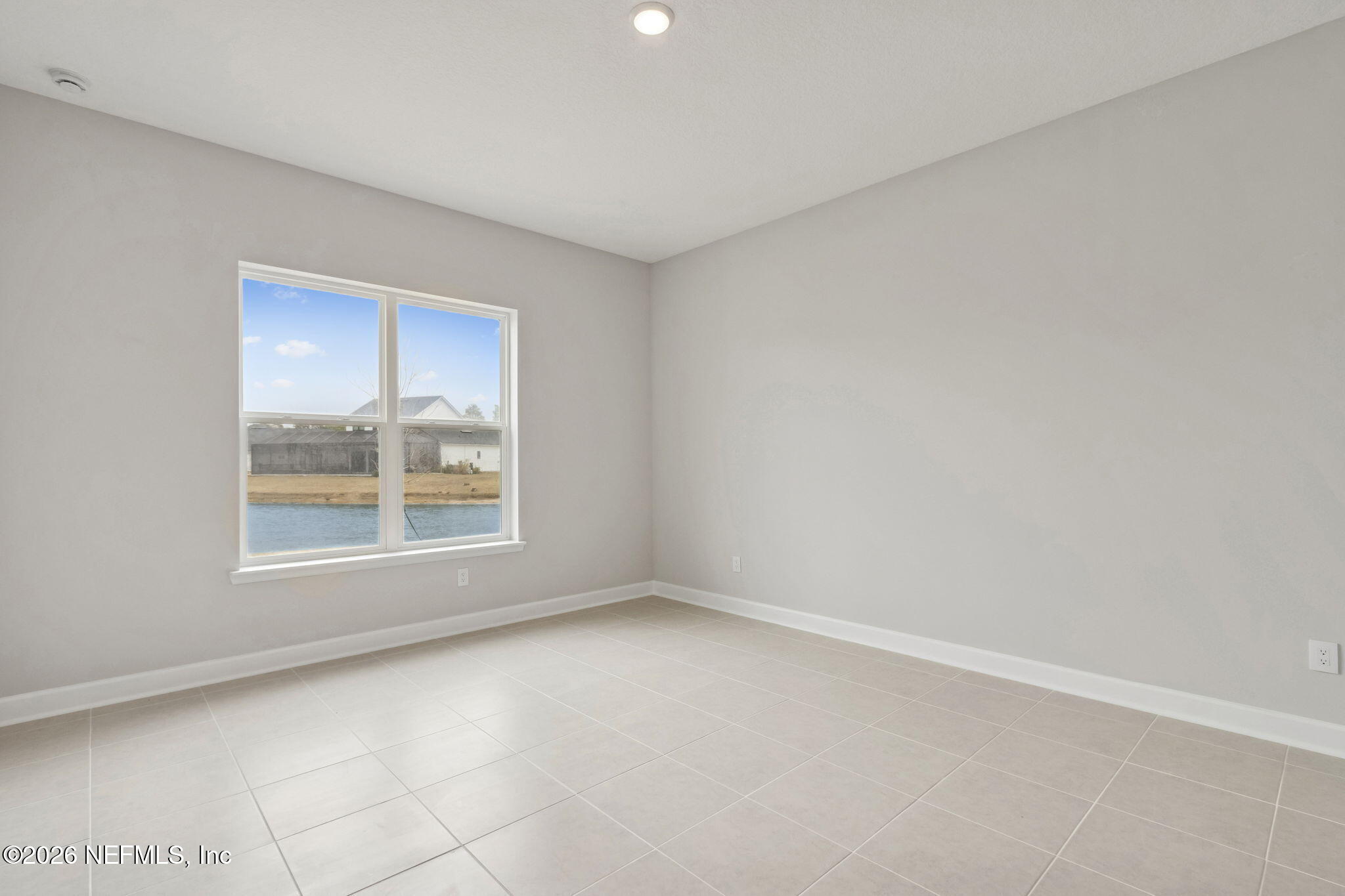 85321 Sandy Rdg Loop Yulee, FL 32097 - Photo 23 of 49 an empty room with a window