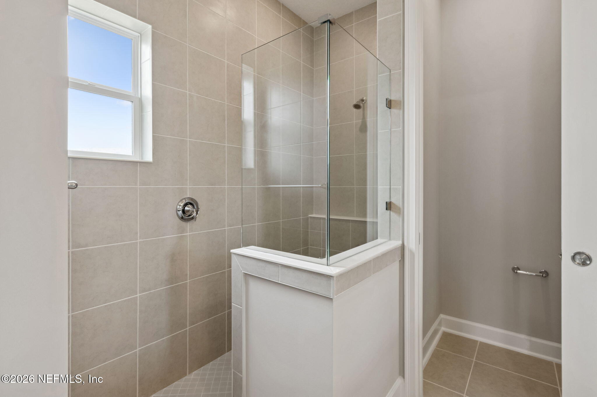 85321 Sandy Rdg Loop Yulee, FL 32097 - Photo 28 of 49 a bathroom with a shower