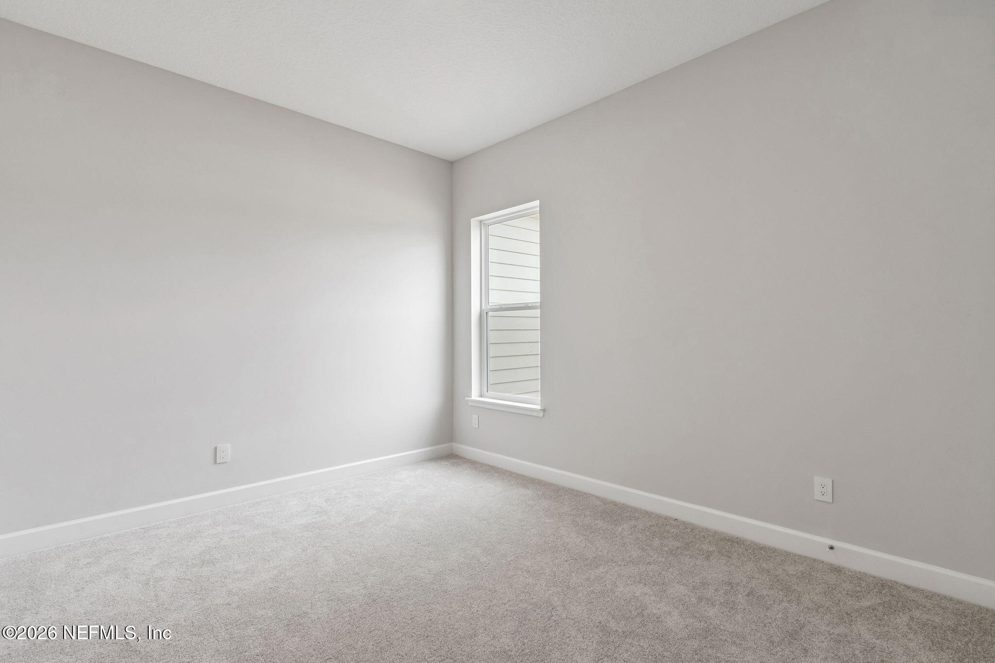 85321 Sandy Rdg Loop Yulee, FL 32097 - Photo 29 of 49 an empty room with a window