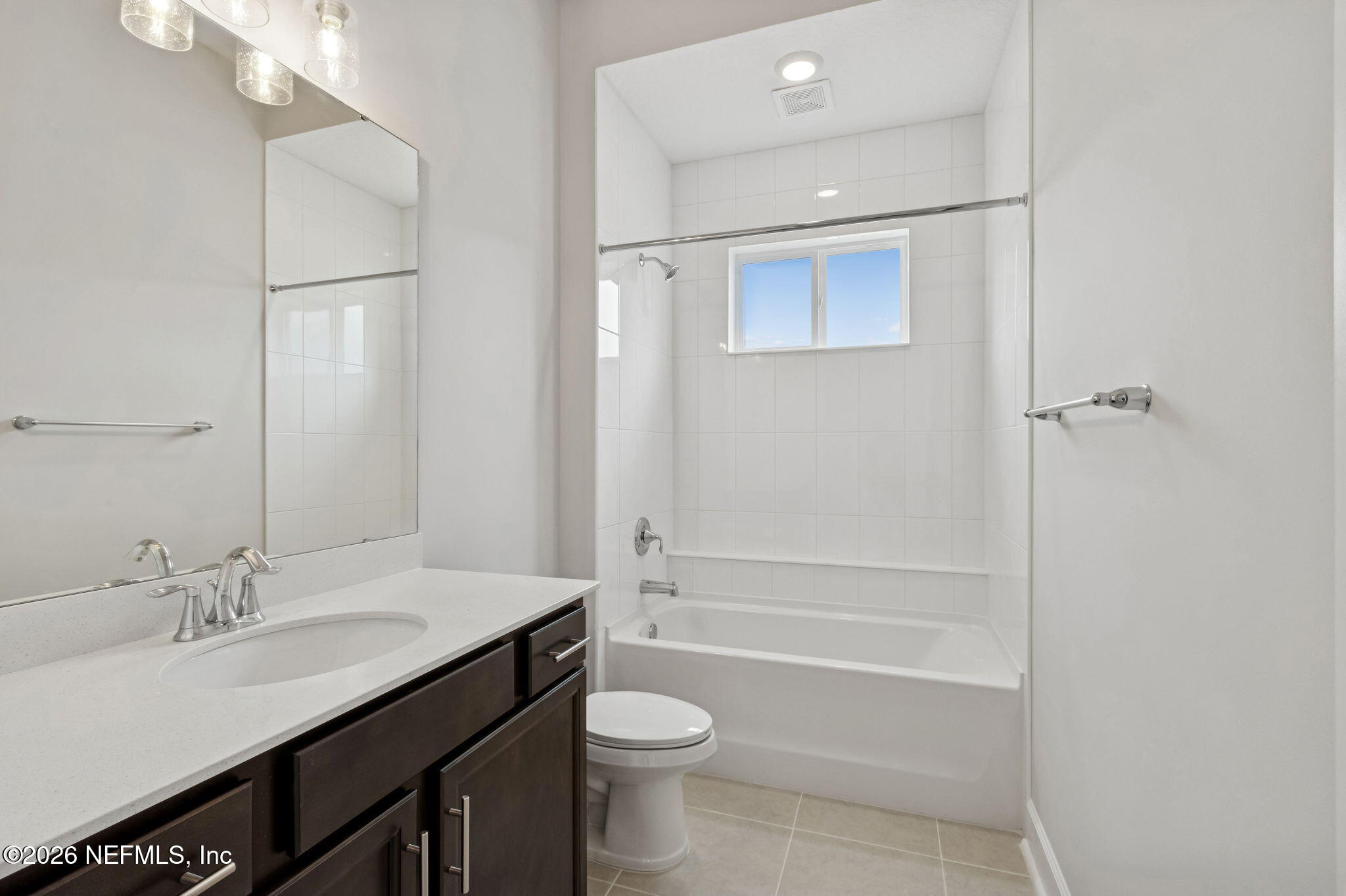 85321 Sandy Rdg Loop Yulee, FL 32097 - Photo 31 of 49 a bathroom with a granite countertop sink toilet and shower