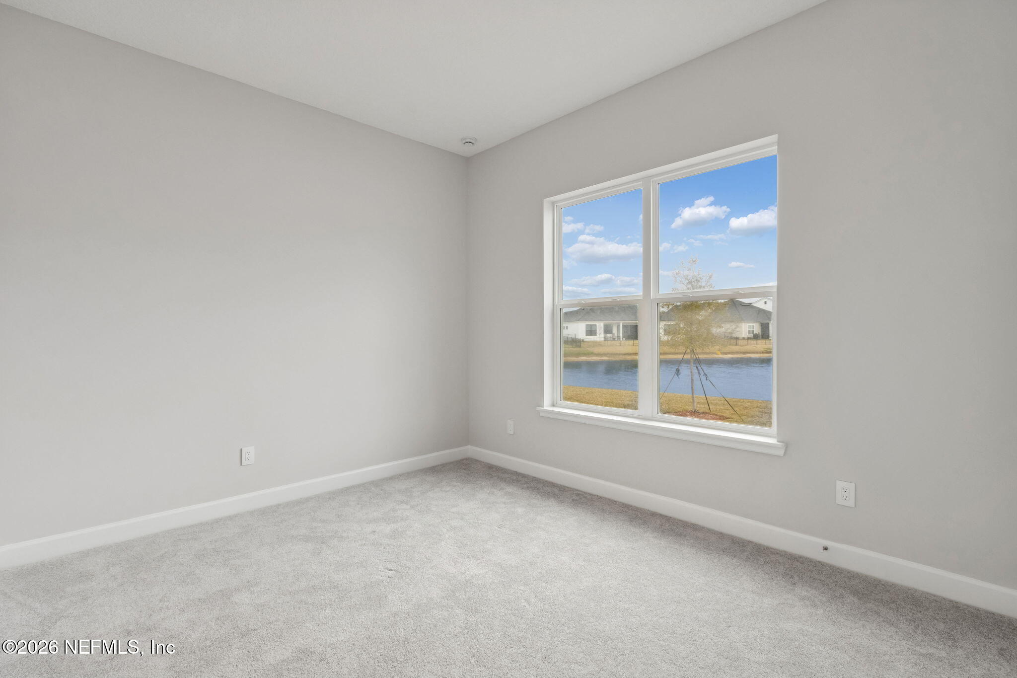 85321 Sandy Rdg Loop Yulee, FL 32097 - Photo 32 of 49 an empty room with a window