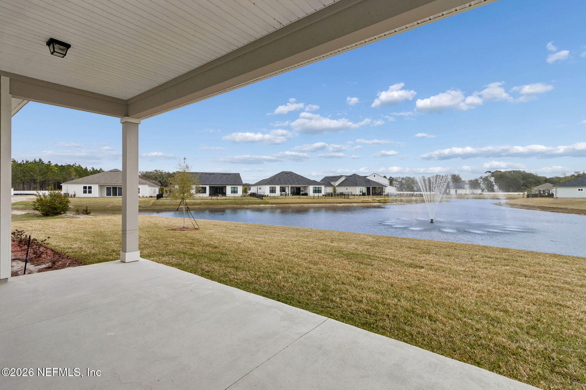 85321 Sandy Rdg Loop Yulee, FL 32097 - Photo 42 of 49 a view of a lake with a city