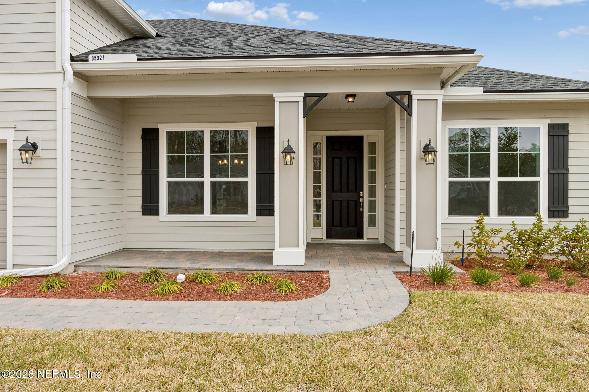 85321 Sandy Rdg Loop Yulee, FL 32097 - Photo 6 of 49 a view of a house with small yard