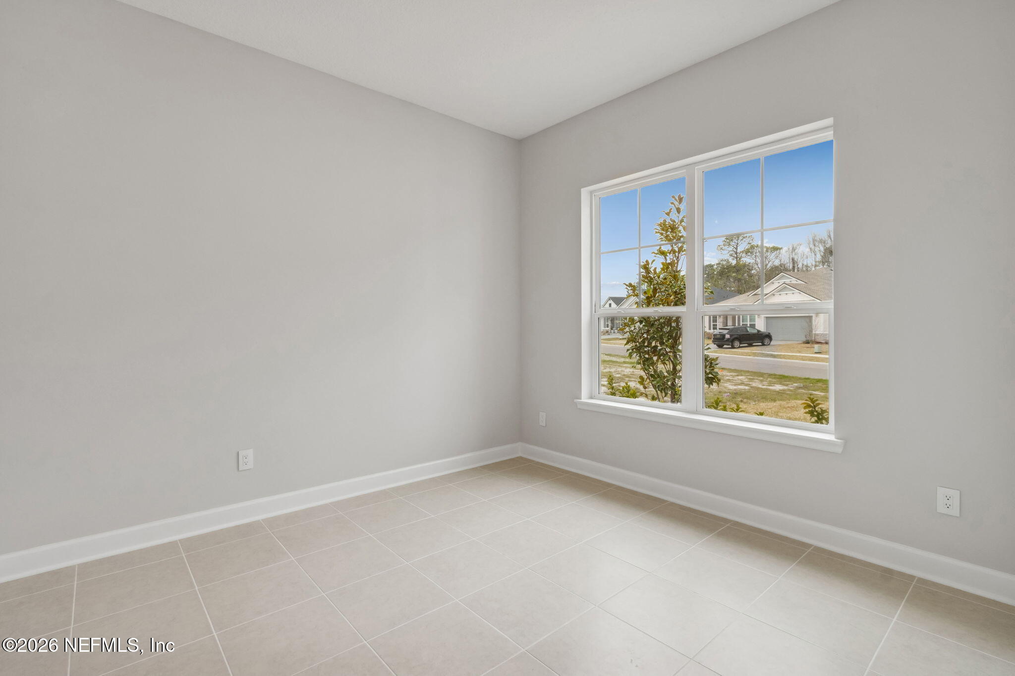 85321 Sandy Rdg Loop Yulee, FL 32097 - Photo 9 of 49 a view of an empty room with a window