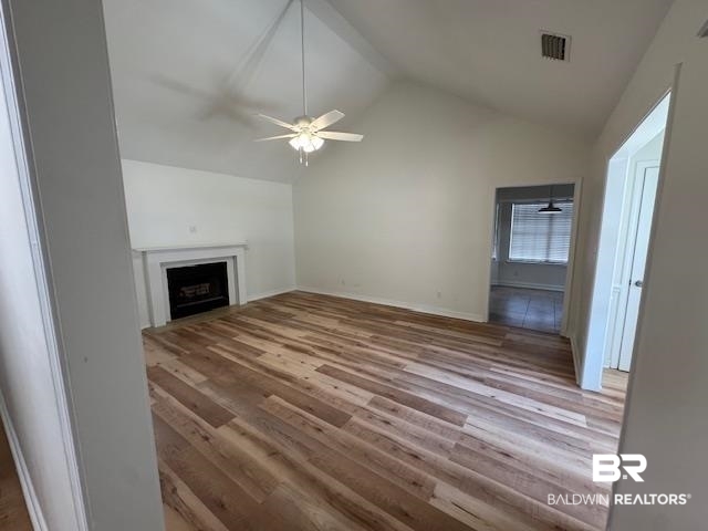 109 Shiloh Drive Daphne, AL 36526 - Photo 5 of 21 Living room with a fireplace and vaulted ceiling