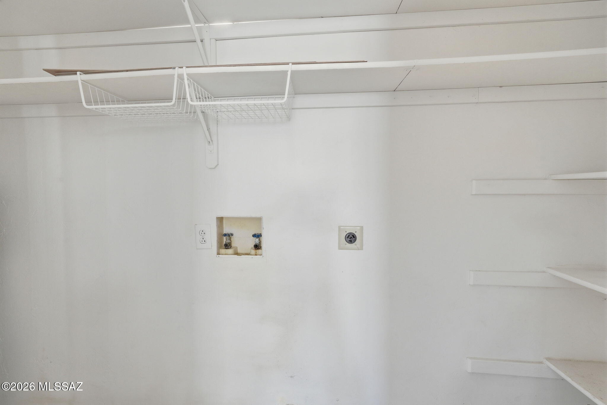 136 West Elvira Road Tucson, AZ 85756 - Photo 22 of 27 a view of a rack on the wall