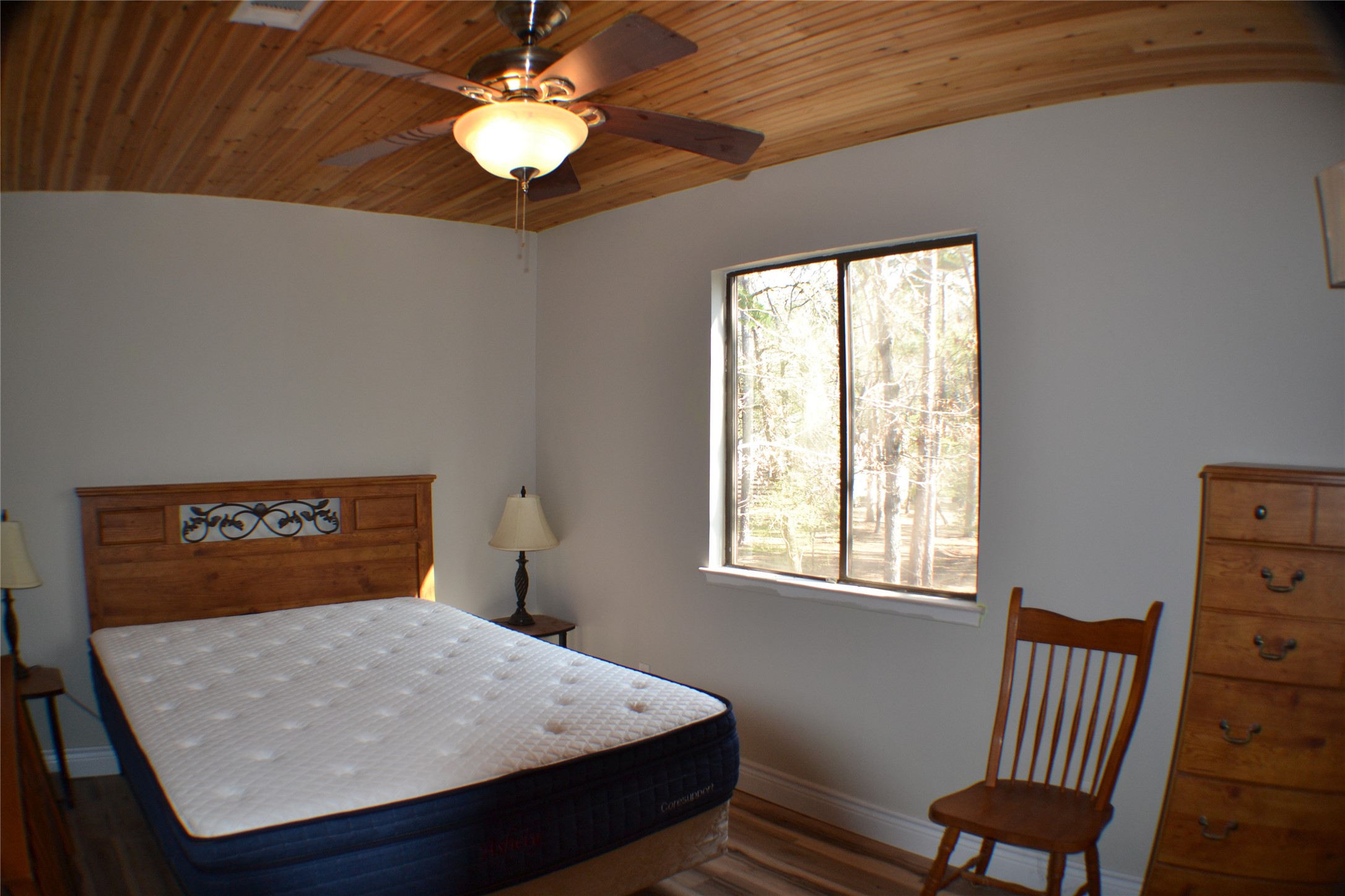 30 Putters Point West Point Blank, TX 77364 - Photo 12 of 20 Bedroom with queen bed and dresser