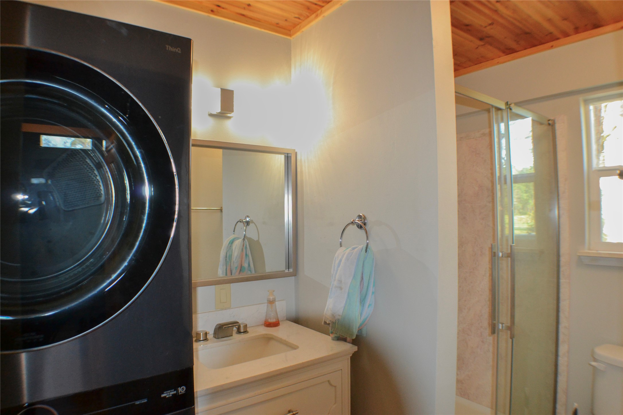 30 Putters Point West Point Blank, TX 77364 - Photo 8 of 20 Full size washer / dryer in main floor full renovated bathroom