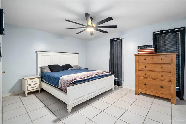 a bedroom with a bed and a closet