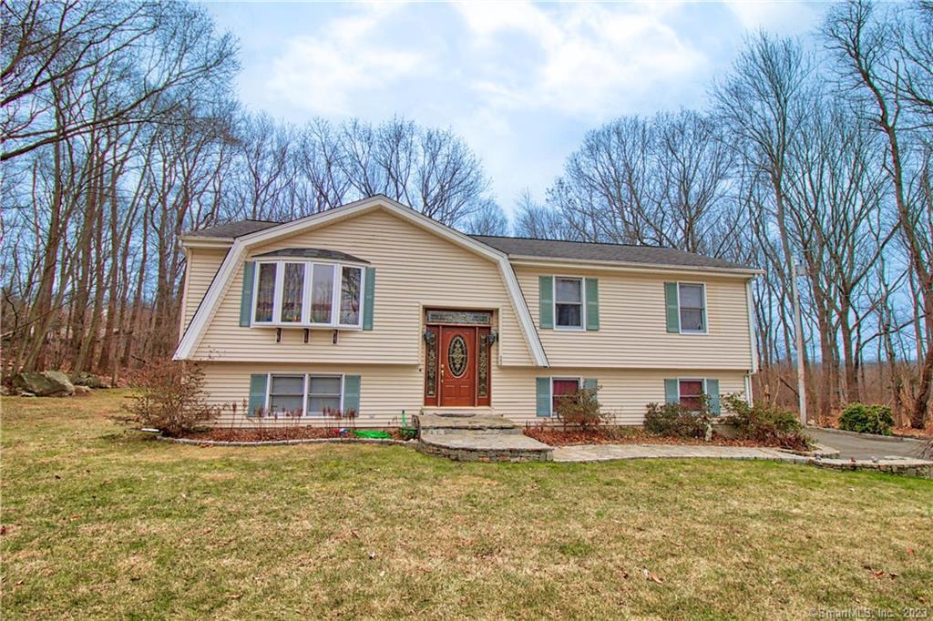 22 Maria Hotchkiss Road Prospect, CT 06712 - Photo 1 of 1 a front view of a house with a yard