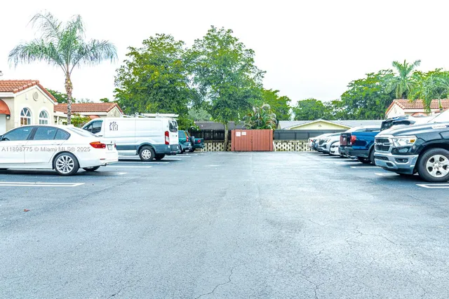 a view of cars parked in a parking lot