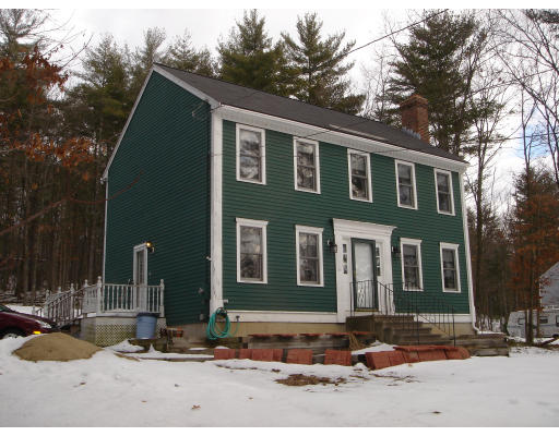 5 Proctor Road Pepperell, MA 01463 - Photo 2 of 12 a front view of a house