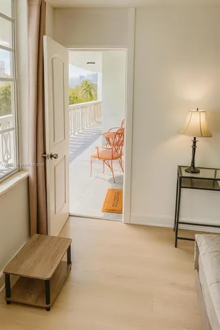 a living room with furniture and a window