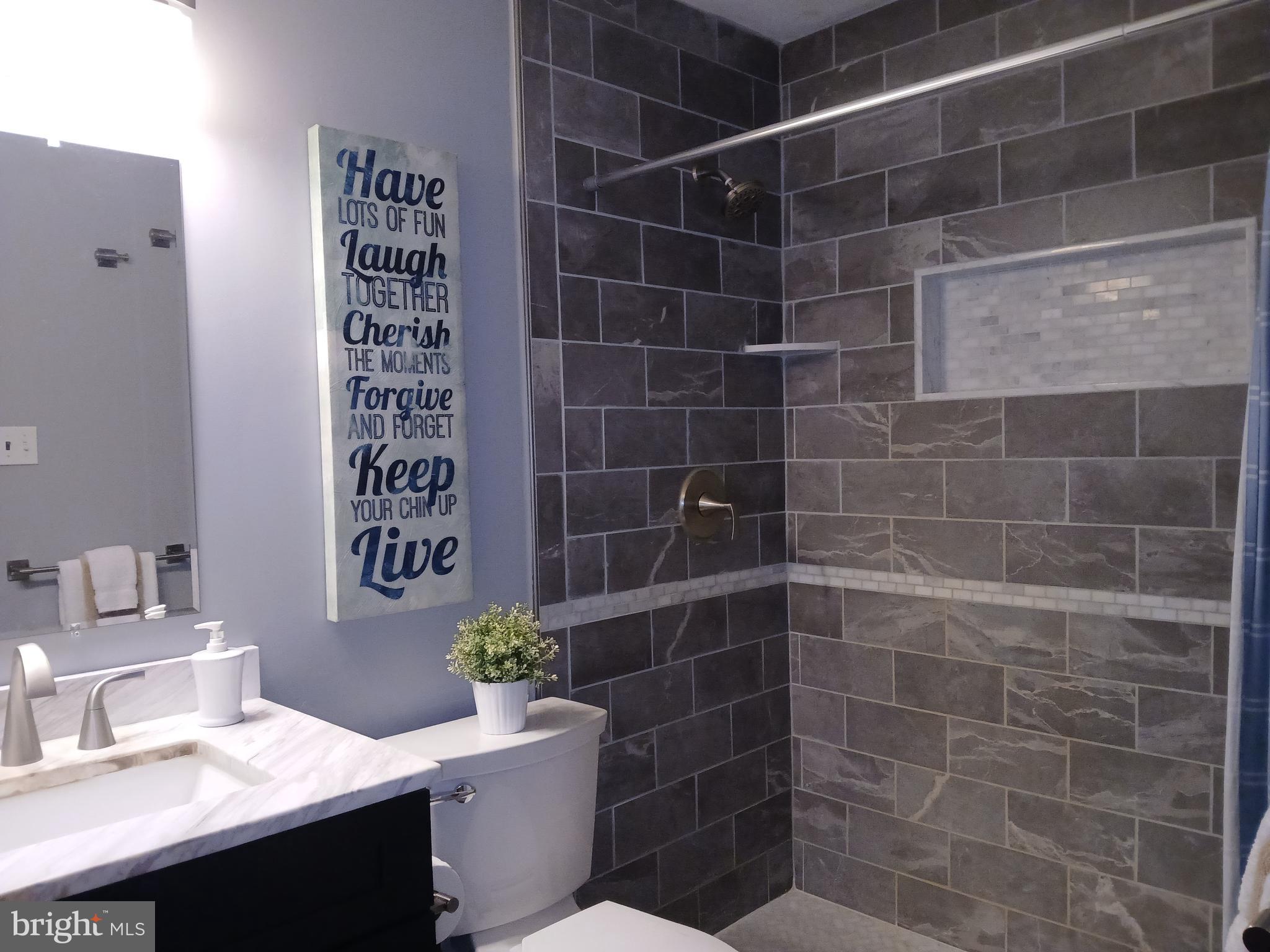 16601 Candy Hill Road Upper Marlboro, MD 20772 - Photo 20 of 55 with full tile surround and granite vanity