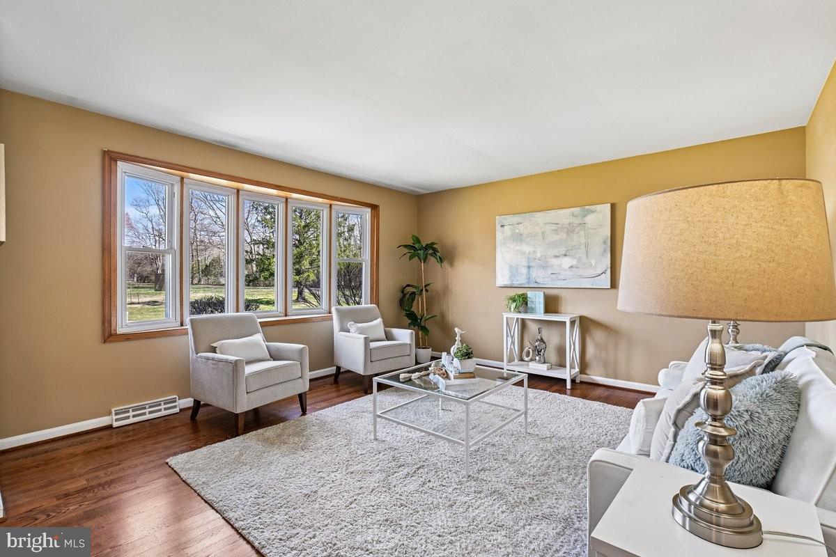 16601 Candy Hill Road Upper Marlboro, MD 20772 - Photo 2 of 55 a living room with furniture and a large window