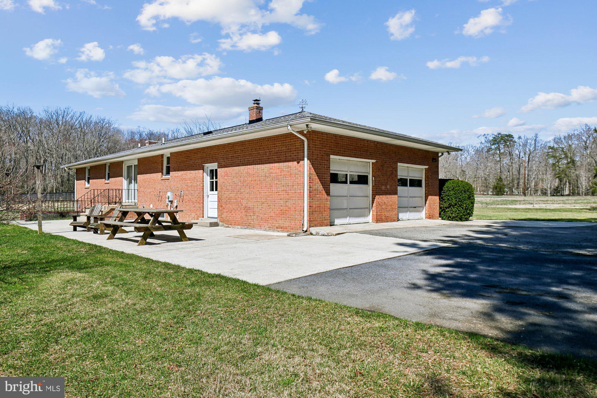 16601 Candy Hill Road Upper Marlboro, MD 20772 - Photo 33 of 55 2 car garage and a patio the length of your home