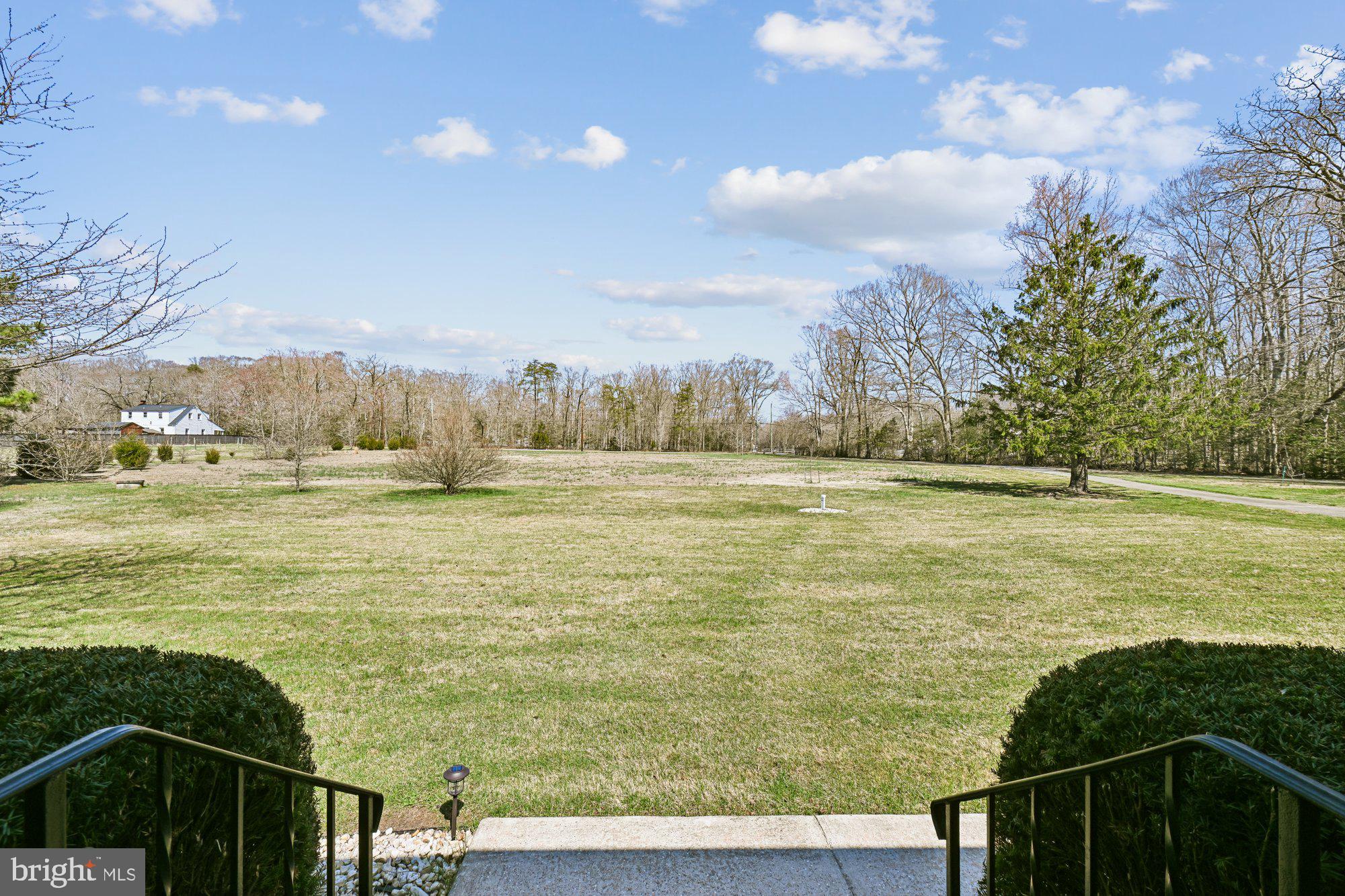16601 Candy Hill Road Upper Marlboro, MD 20772 - Photo 38 of 55 a view of an ocean and a yard