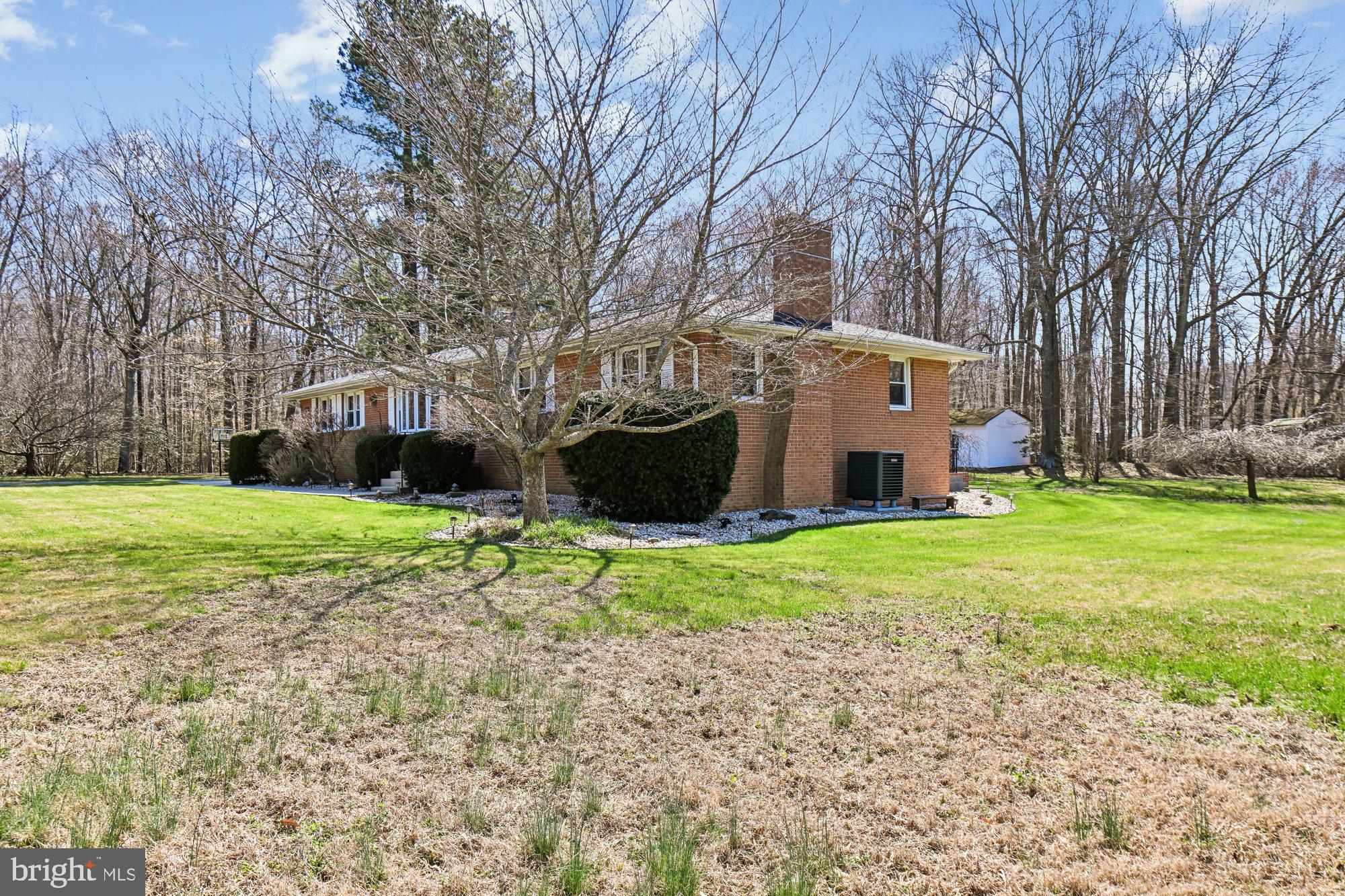 16601 Candy Hill Road Upper Marlboro, MD 20772 - Photo 40 of 55 Expansive yard with surrounding tree line