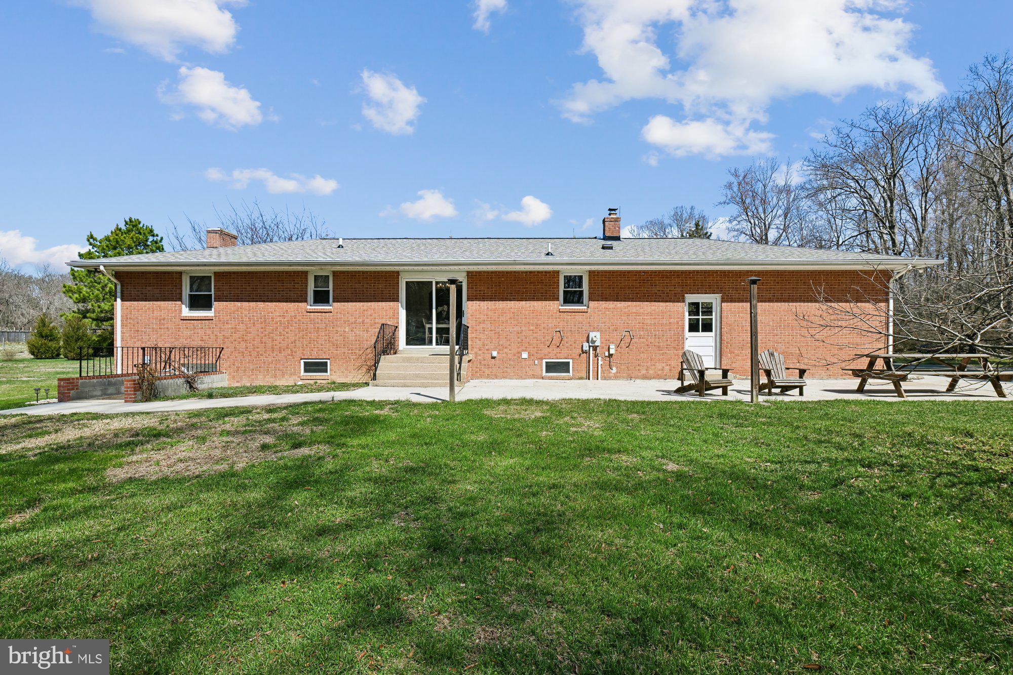 16601 Candy Hill Road Upper Marlboro, MD 20772 - Photo 42 of 55 a front view of house with yard and seating area