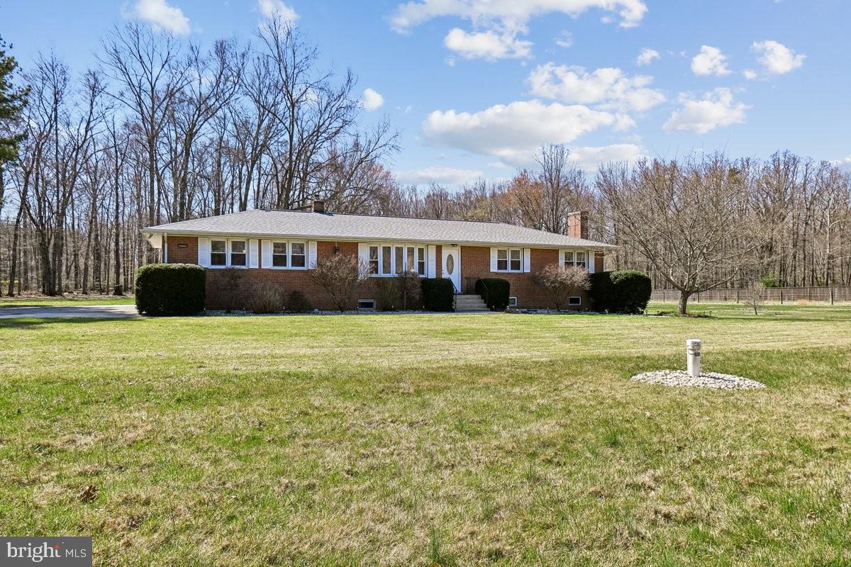 16601 Candy Hill Road Upper Marlboro, MD 20772 - Photo 7 of 55 a view of house with yard and sitting area