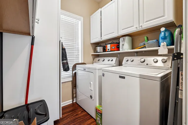 a utility room with dryer and washer