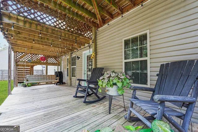 a patio with table and chairs