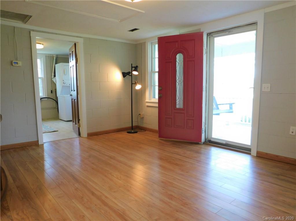 5411 Armfield Mill Road Monroe, NC 28112 - Photo 12 of 33 a view of a hallway with wooden floor and closet