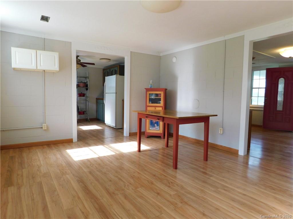 5411 Armfield Mill Road Monroe, NC 28112 - Photo 16 of 33 a view of a livingroom with furniture and wooden floor