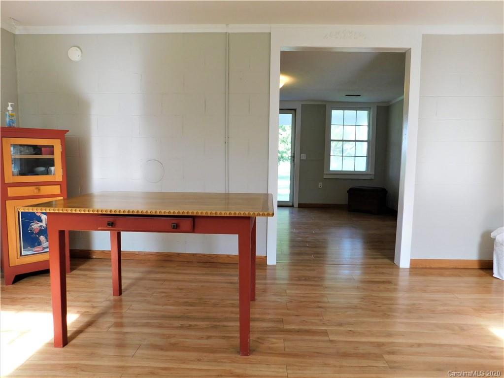 5411 Armfield Mill Road Monroe, NC 28112 - Photo 17 of 33 a view of a room with furniture and wooden floor