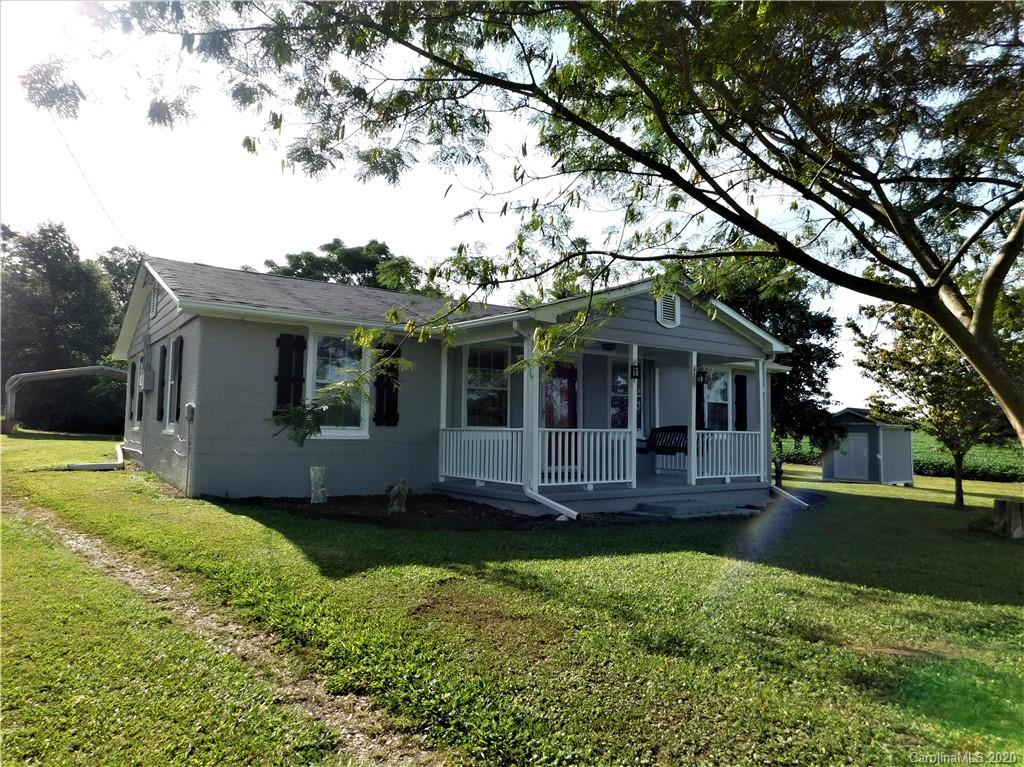 5411 Armfield Mill Road Monroe, NC 28112 - Photo 3 of 33 a view of a house with a yard and tree s
