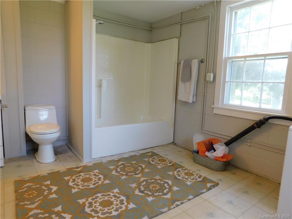 5411 Armfield Mill Road Monroe, NC 28112 - Photo 29 of 33 a bedroom with a bed and a window