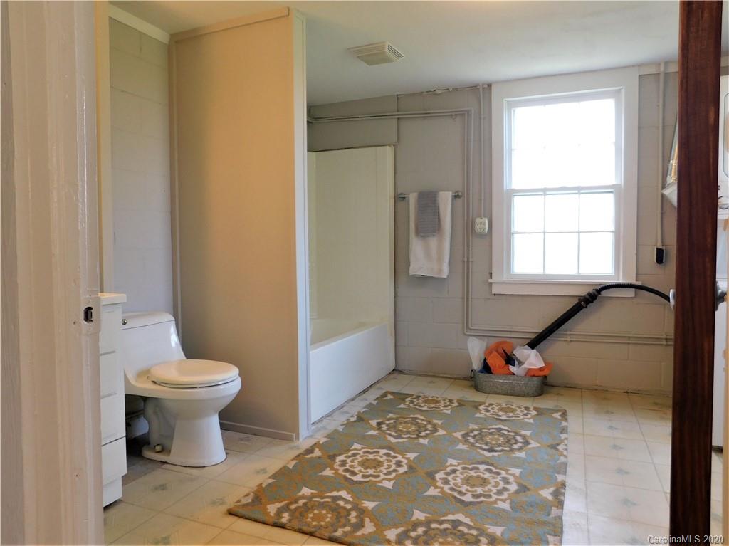 5411 Armfield Mill Road Monroe, NC 28112 - Photo 30 of 33 a bathroom with a sink toilet and a window