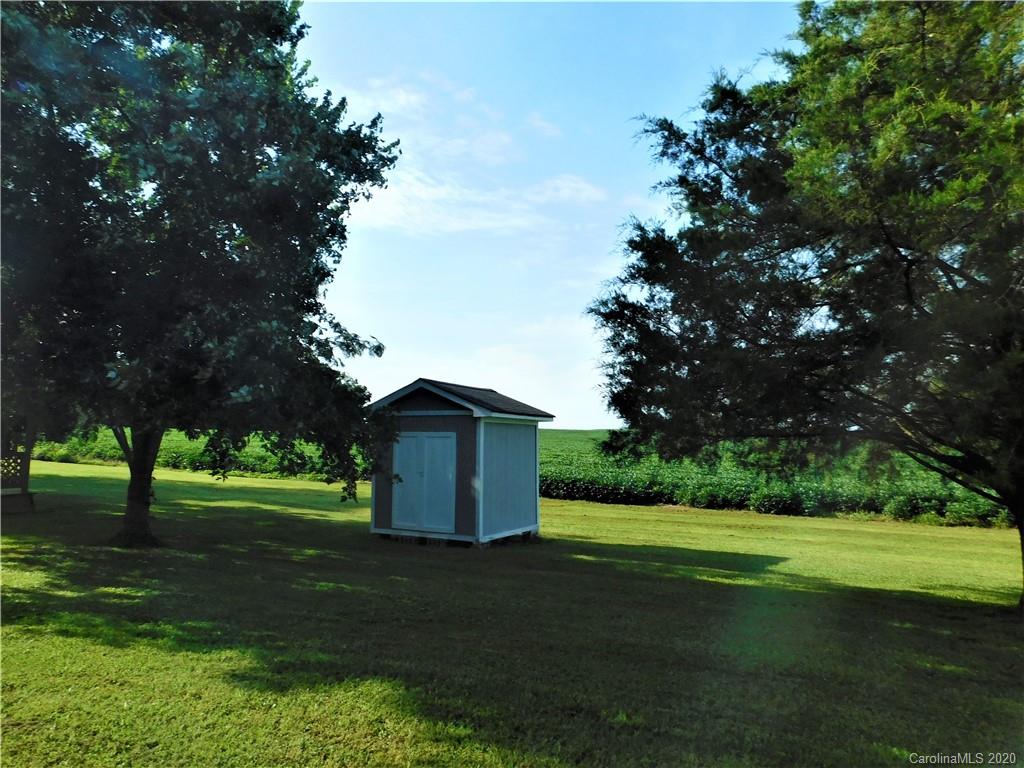5411 Armfield Mill Road Monroe, NC 28112 - Photo 6 of 33 a big yard with large trees