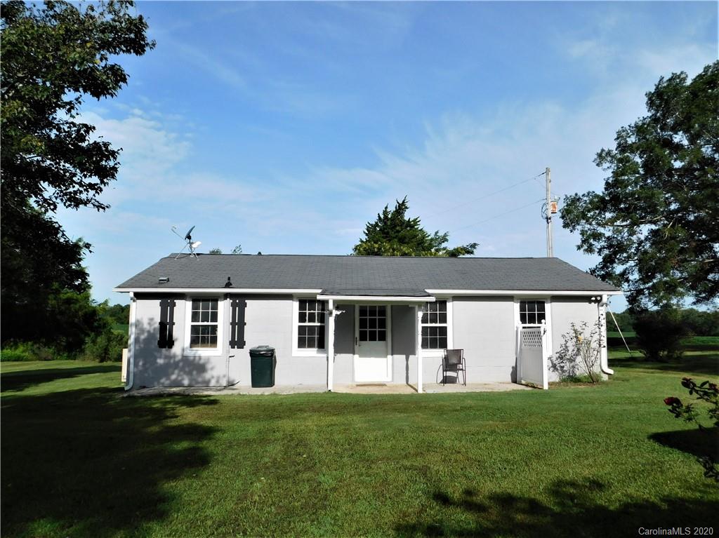 5411 Armfield Mill Road Monroe, NC 28112 - Photo 10 of 33 a front view of a house with a garden