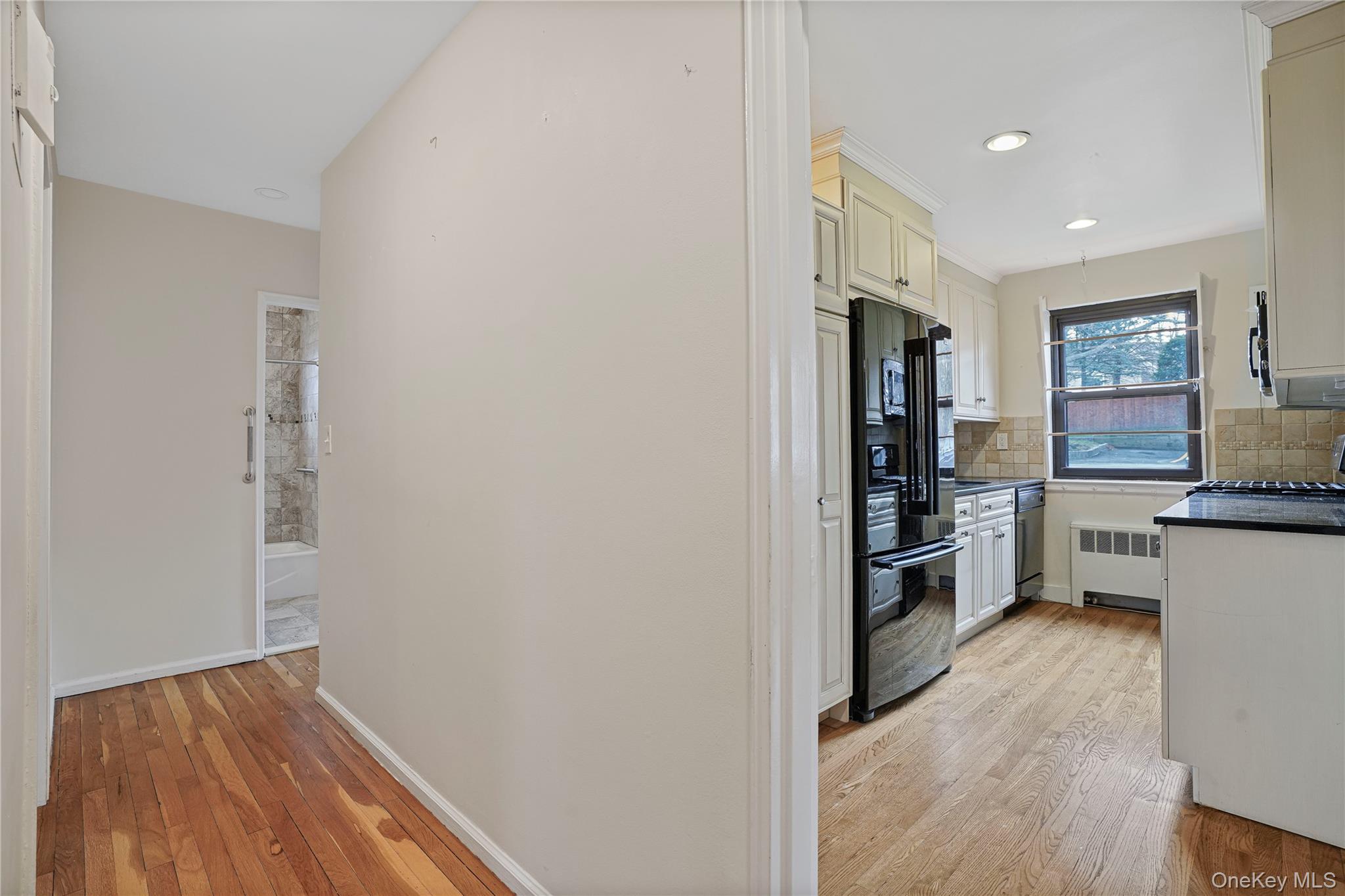 17 Manor House Drive, Unit K14 Dobbs Ferry, NY 10522 - Photo 13 of 31 a view of kitchen with refrigerator and wooden floor