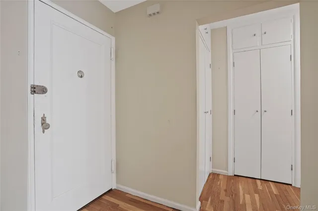 a view of room with hardwood floor