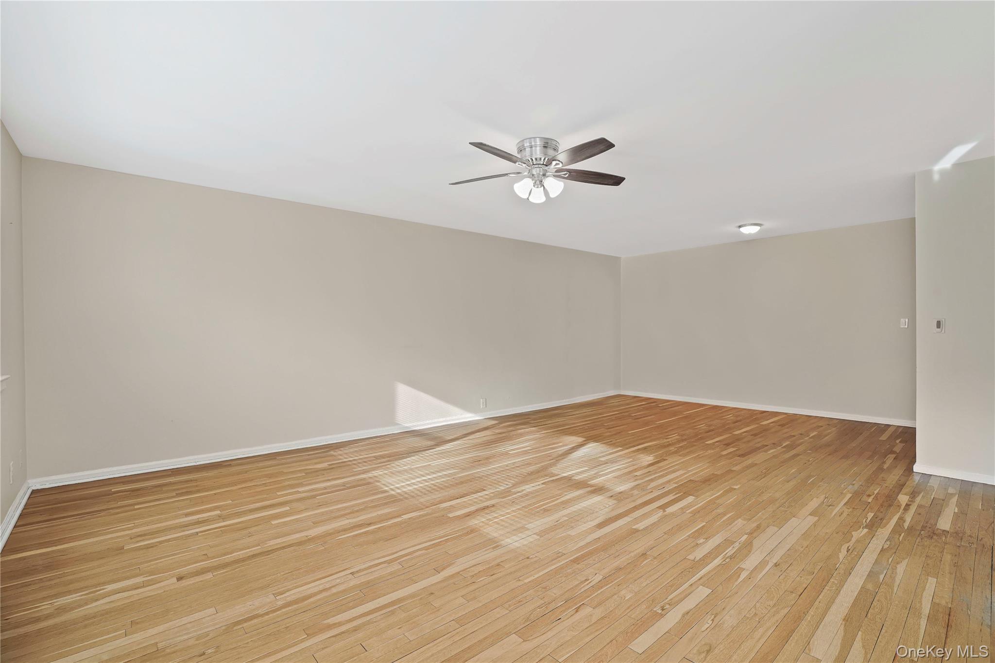 17 Manor House Drive, Unit K14 Dobbs Ferry, NY 10522 - Photo 5 of 31 a view of empty room with wooden floor