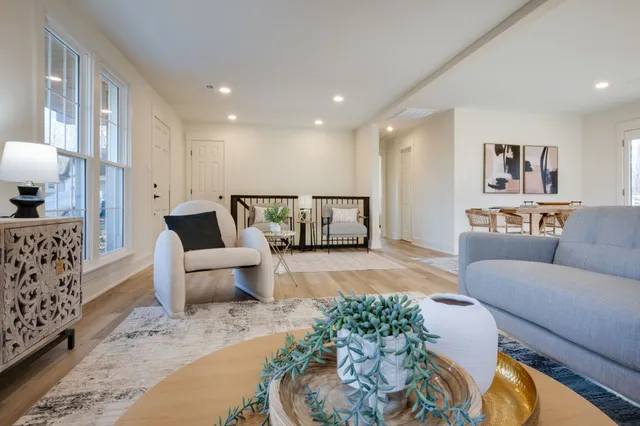 a living room with furniture and a couch