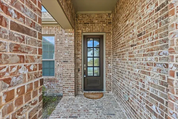 a front view of a house with a shower