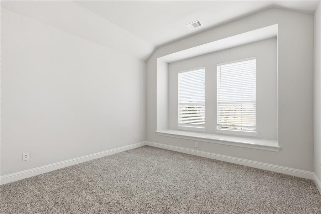 910 Cone Flower Drive Prosper, TX 75078 - Photo 26 of 40 an empty room with a window
