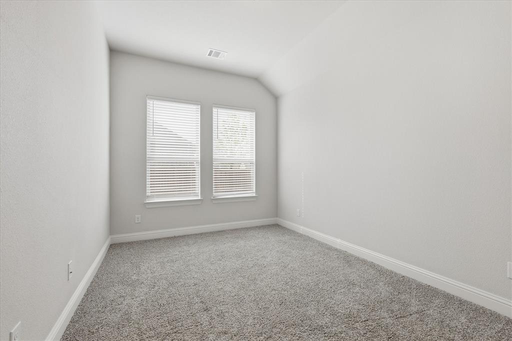 910 Cone Flower Drive Prosper, TX 75078 - Photo 30 of 40 an empty room with a window