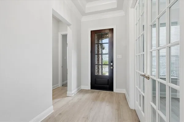 a view of entryway with wooden floor